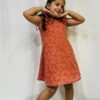 Little girl in mul cotton polka dot dress