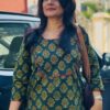 Woman wearing green ajrakh kurta for office