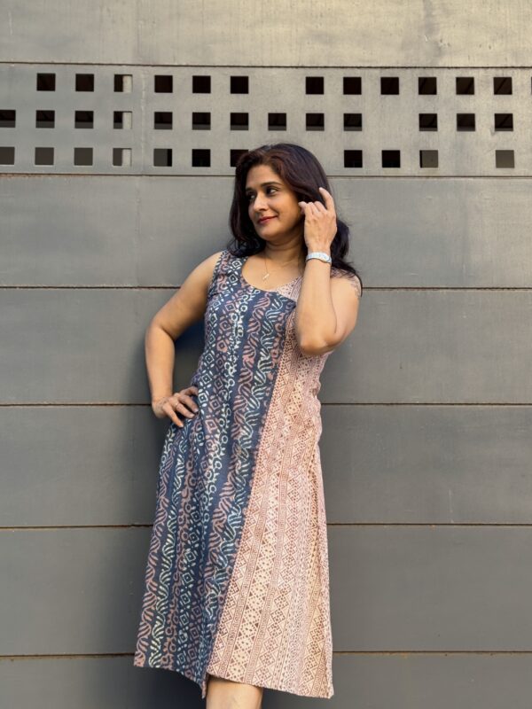 A beautiful half n half dress in contrasting colours makes cutting edge fashion