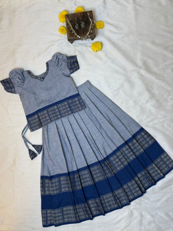 Light blue cotton pavadai sattai in sambalpuri ikkats in the festive collection for girls